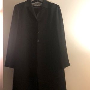 Black long duster style suit jacket and pants